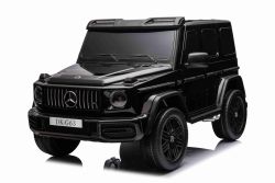 Coche eléctrico para niños Mercedes-Benz G63 AMG 4x4² Biplaza 24V, Pintado negro, Reproductor MP4 con entrada USB/AUX, Tracción 4x4, Batería 24V/7Ah, 4 motores de 200W, Ruedas EVA con suspensión, Asientos de polipiel, Mando a distancia , Licenciado
