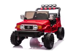 Coche eléctrico para niños Toyota FJ Cruiser XXL con tracción 4x4, licencia oficial (dos plazas), rojo, batería de litio portátil, chasis alto, dos asientos, suspensión trasera, control remoto 2.4 GHz, reproductor MP3 con Bluetooth, luces LED