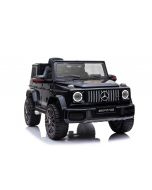 Mercedes G New, color negro, con licencia original, batería, puertas que se abren, asiento individual, 2 x motor, batería de 12 V, control remoto de 2.4 Ghz, suspensión trasera, arranque suave