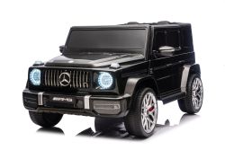 Coche eléctrico para niños Mercedes-Benz G63 AMG 4x4, dos plazas, 24V, negro, reproductor MP3 con conexión USB/AUX y Bluetooth, tracción 4x4, batería de litio, ruedas EVA con suspensión, asientos de cuero sintético, control remoto, modelo con licencia ofi
