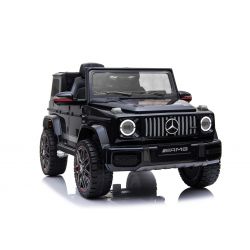 Mercedes G New, color negro, con licencia original, batería, puertas que se abren, asiento individual, 2 x motor, batería de 12 V, control remoto de 2.4 Ghz, suspensión trasera, arranque suave