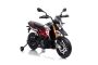 Moto eléctrica APRILIA DORSODURO 900, con licencia, batería de 12V, ruedas suaves de EVA, motores de 2 x 18W, suspensión, marco de metal, horquilla de metal, ruedas auxiliares, rojo